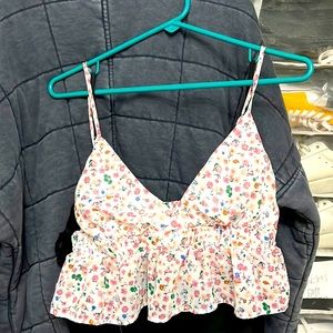 Medium floral blouse.